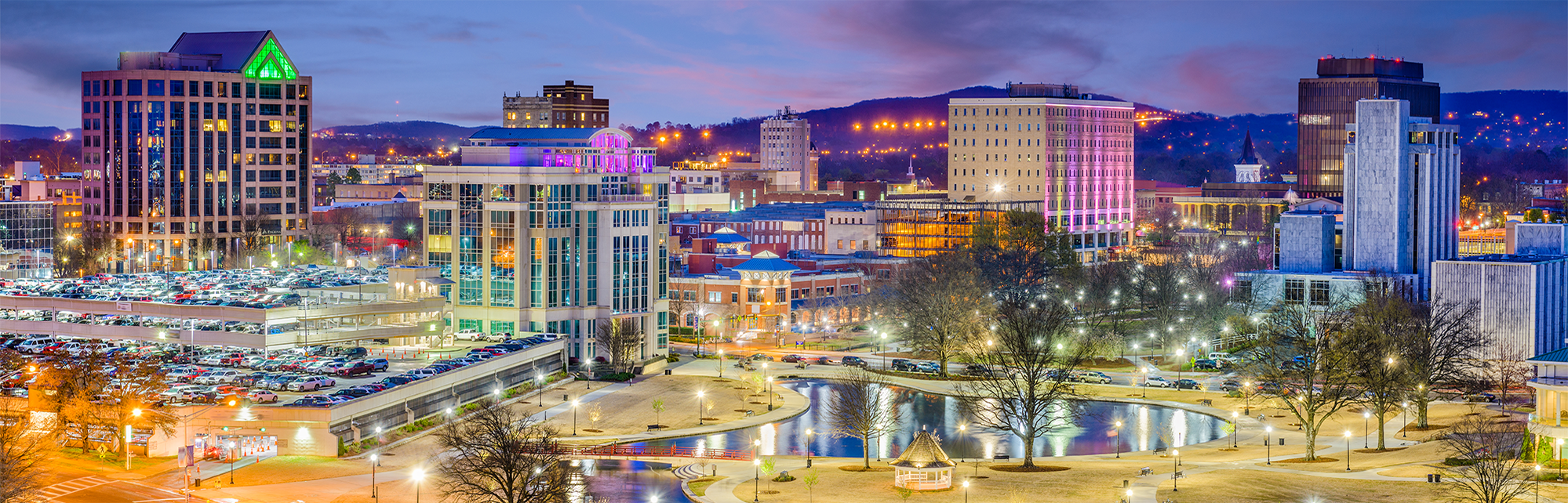 Huntsville, Alabama, USA park and downtown cityscape at twilight